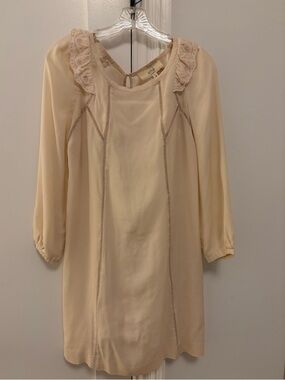 Silk long sleeve dress with shoulder ruffles and eyelet detail